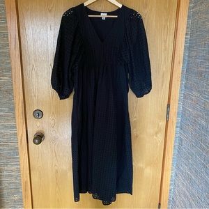 100% Cotton Black Eyelet Dress. Fully lined except for sleeves. V-neck. Size M
